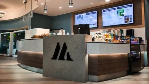 Modern snack bar offering various pre run snack recipes with menu displays and a sleek counter design.