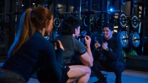 Modern gym showcasing various machines and free weights, illustrating the free weights vs machines debate.