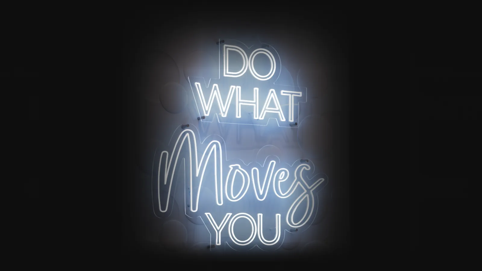 Neon sign with the words "Do What Moves You," inspiring thoughts on how long should a workout be for fitness goals.
