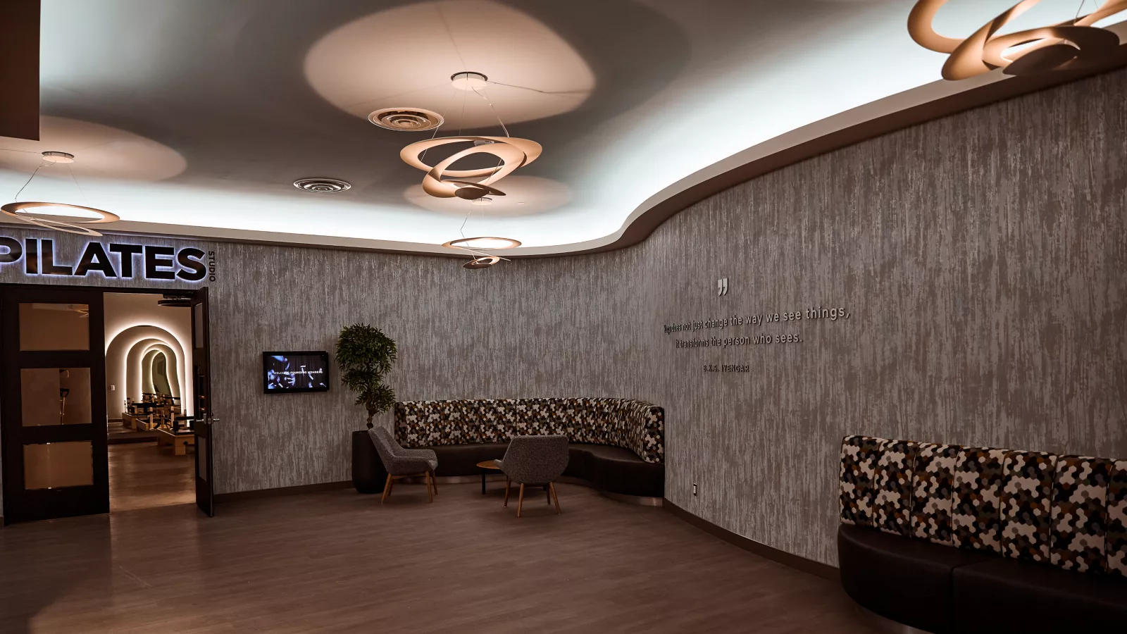 MOVATI Zen Lounge with people relaxing, highlighting mindfulness benefits like stress reduction and emotional resilience.